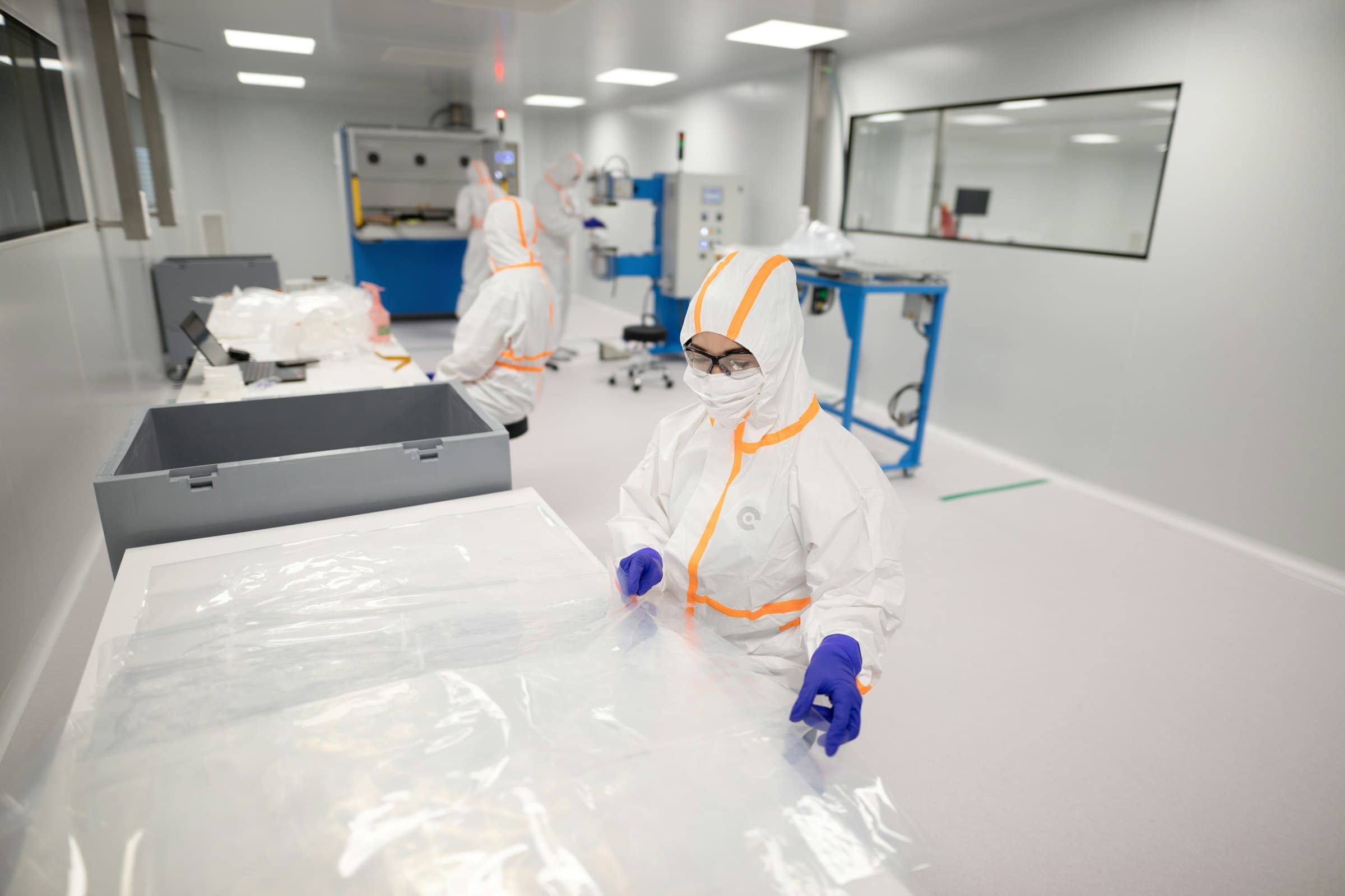 Pharmaceutical technicians in a WHO-GMP aligned clean-room manufacturing environment